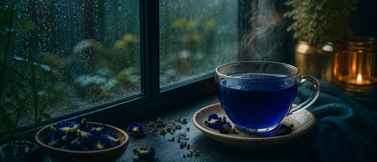 best herbal tea for monsoon immunity India — butterfly pea flower tea by a rainy window