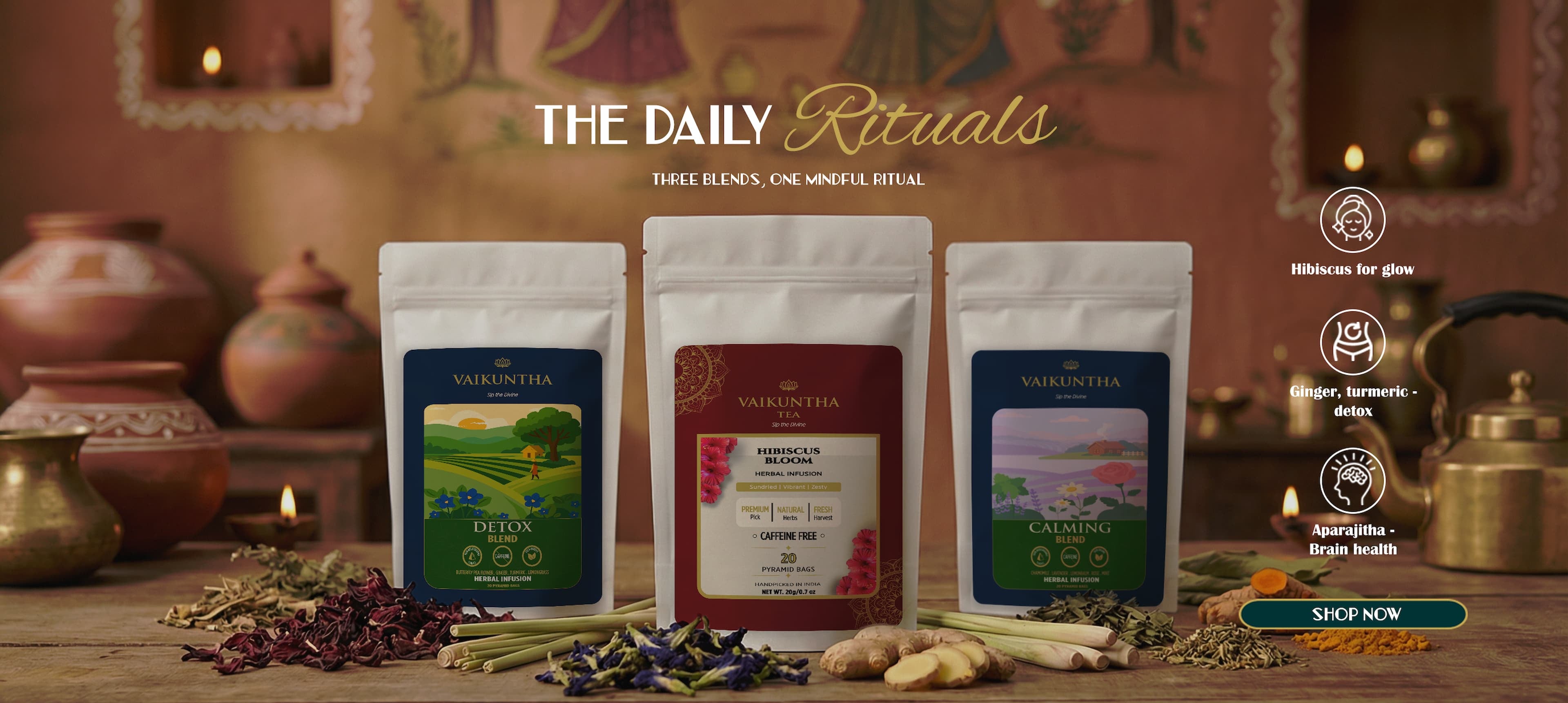 Tea packages on a wooden surface with decorative items and 'The Daily Rituals' branding.